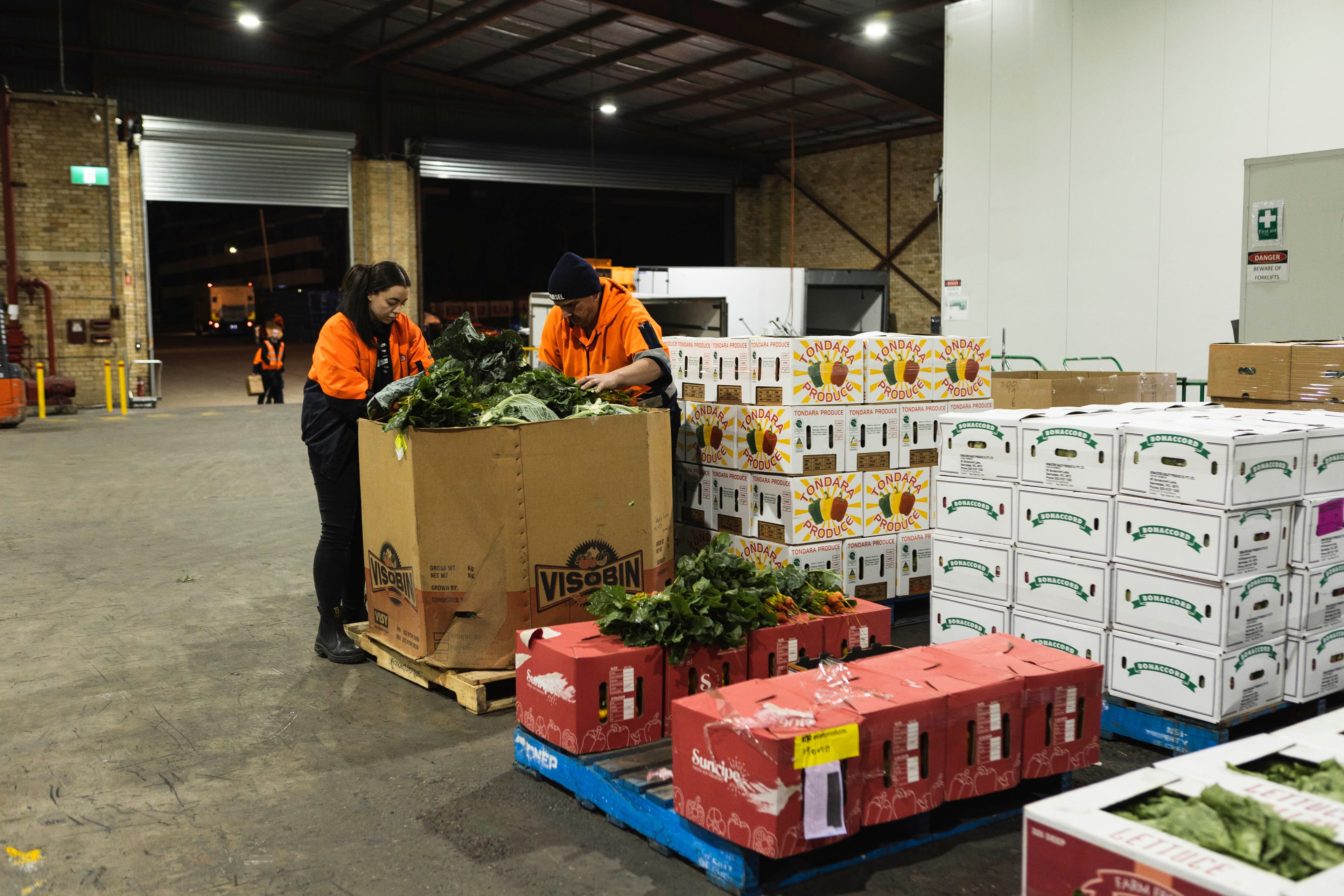 Morco Fresh staff walking through the market